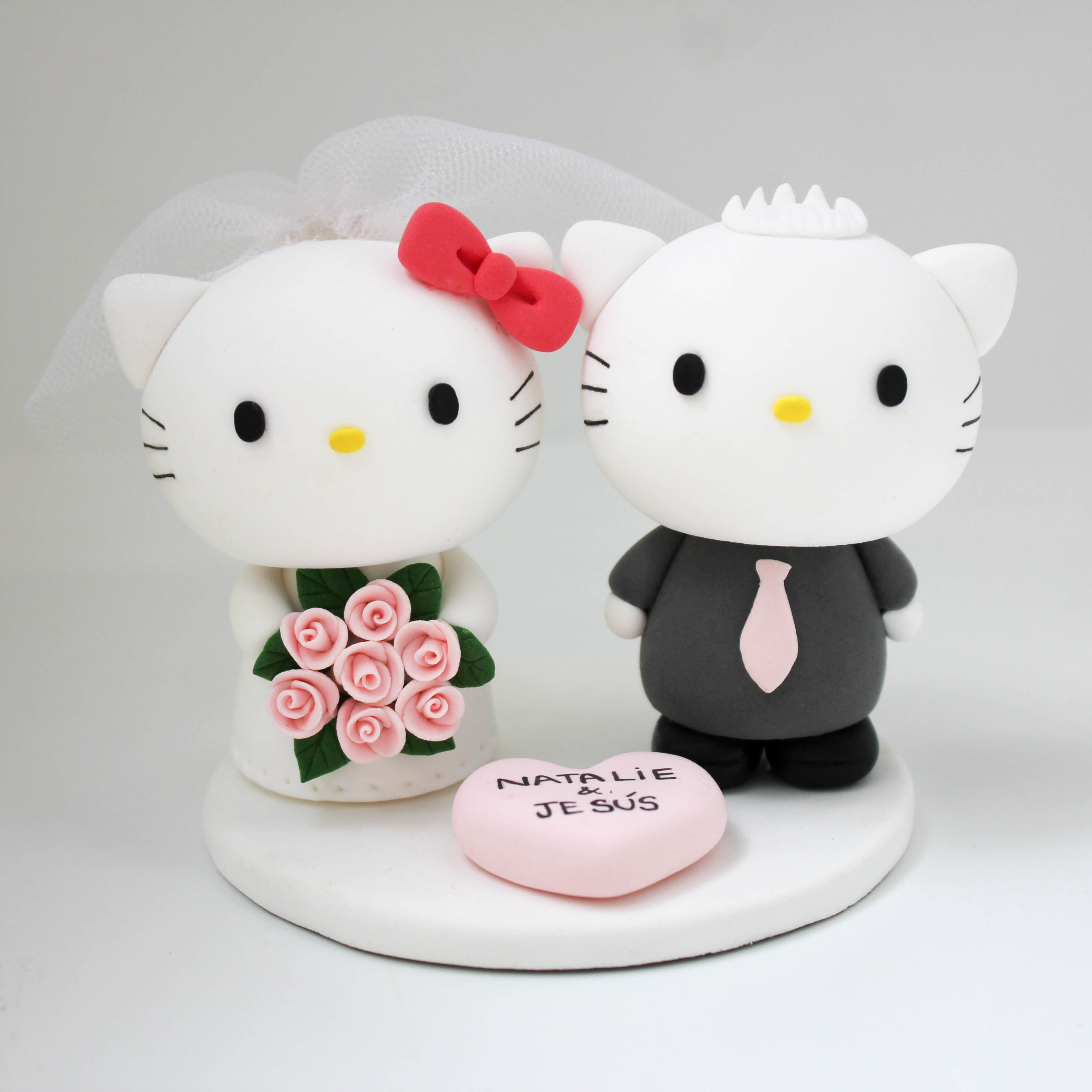 https://www.worldcaketopper.com/images/thumbs/0003189_hello-kitty-wedding-cake-topper_5500.jpeg
