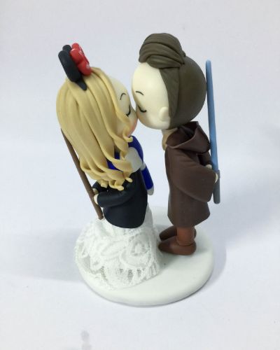 Picture of Luke Skywalker Groom And Ravenclaw Bride Wedding Cake Topper, Harry Potter inspire wedding theme, Disney wedding theme and Star wars wedding topper