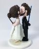 Picture of Short Bride & Tall Groom Wedding Cake Topper, Lightsaber Wedding Cake Topper, Wand Wedding Cake Topper