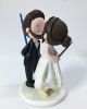 Picture of Short Bride & Tall Groom Wedding Cake Topper, Lightsaber Wedding Cake Topper, Wand Wedding Cake Topper