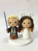 Picture of Jedi Lightsaber Groom & Minnie Mouse Bride with Mickey Pretzel Wedding Cake Topper, Star Wars & Disney Wedding Theme