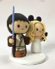 Picture of Star Wars & Mickey wedding cake topper, Bride with Blaster and Groom with Lightsaber topper