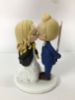 Picture of Gryffindor House Bride & Lightsaber Groom Wedding Cake Topper, Harry Potter & Star Wars Wedding Theme