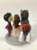 Picture of Kissing bride & groom with a horse, dogs and cat wedding cake topper, custom pet clay figurine